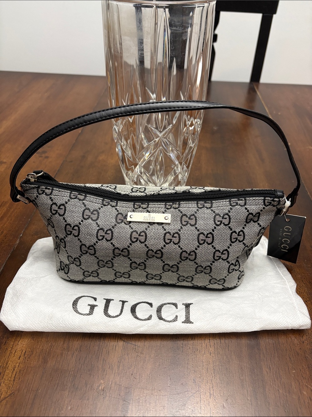 GG Gray and Black Canvas Wristlet with dust bag. New with tags.